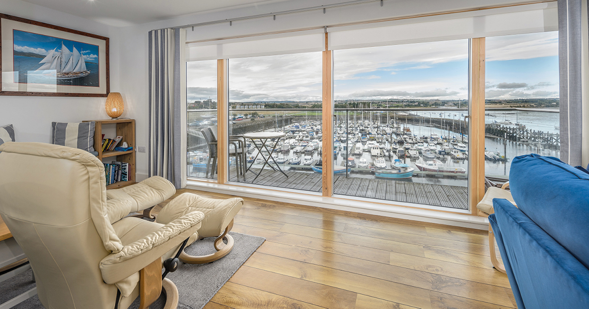 Image showcasing Take a Look Inside This Cool Coastal Apartment With Stunning Sea Views ...